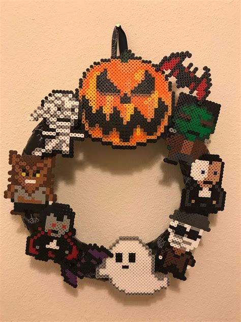 Halloween Perler Bead Wreath | Perler beads designs, Halloween beads, Perler bead art