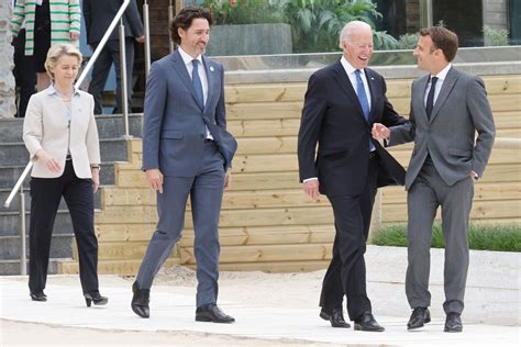 No longer limited to the ‘raise hand’ button, G7 leaders are shaking hands again. - The New York ...