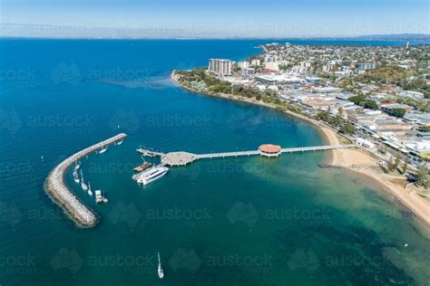 Image of Aerial view of Redcliffe Pier and coastline. - Austockphoto