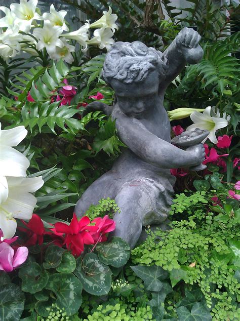 Cherub statue in the Anna Scripps Whitcomb Conservatory on Belle Isle ...