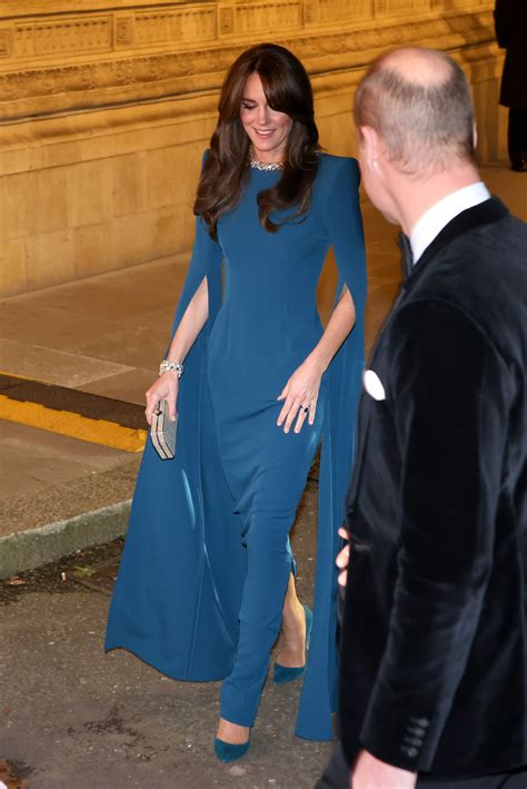 Kate Middleton wears bold-shouldered blue Safiyaa gown at Royal Variety ...