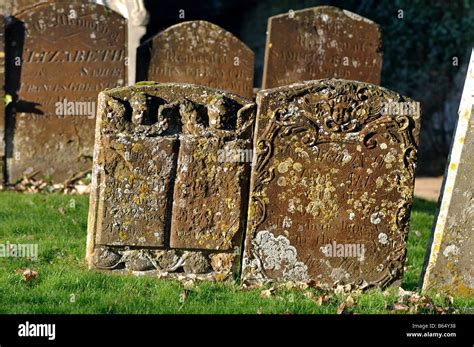 Old gravestones in St. Mary`s churchyard, Adderbury, Oxfordshire, England, UK Stock Photo - Alamy