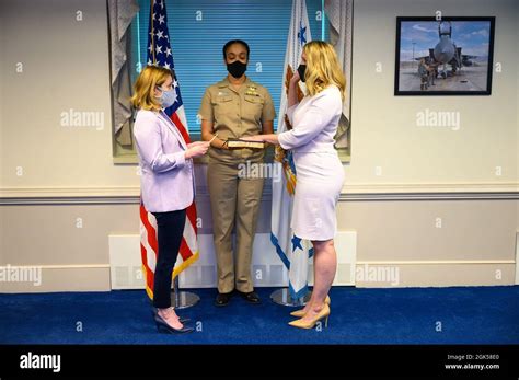 Deputy Secretary of Defense Dr. Kathleen H. Hicks swears in Meredith Berger as the Assistant ...