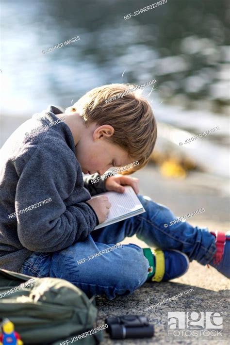 Boy writing in diary, Stock Photo, Picture And Royalty Free Image. Pic ...