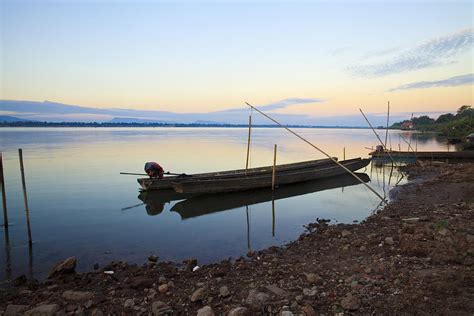 Fishing boats in the Mekong River Photograph by Sorapong Chaipanya