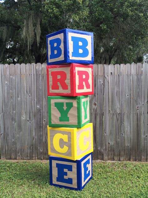 Blocks I made for my son's Toy Story Birthday party. Just covered boxes using brown shipping ...