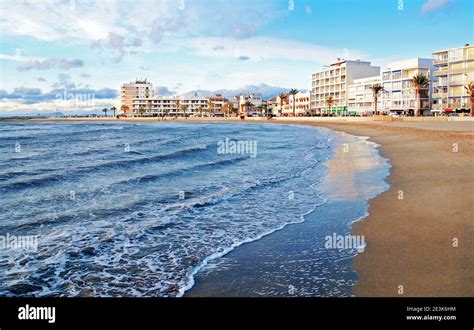 Beach in front of the buildings at Le Grau du Roi in Occitanie, France ...