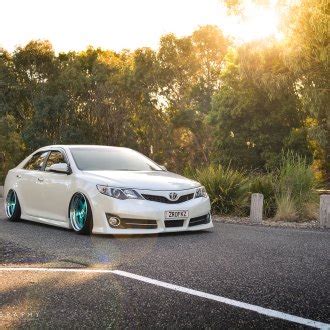 Stylish Black Toyota Camry Sporting TIS Wheels — CARiD.com Gallery