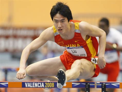 Liu Xiang wins gold in men's 60m hurdles at indoor worlds