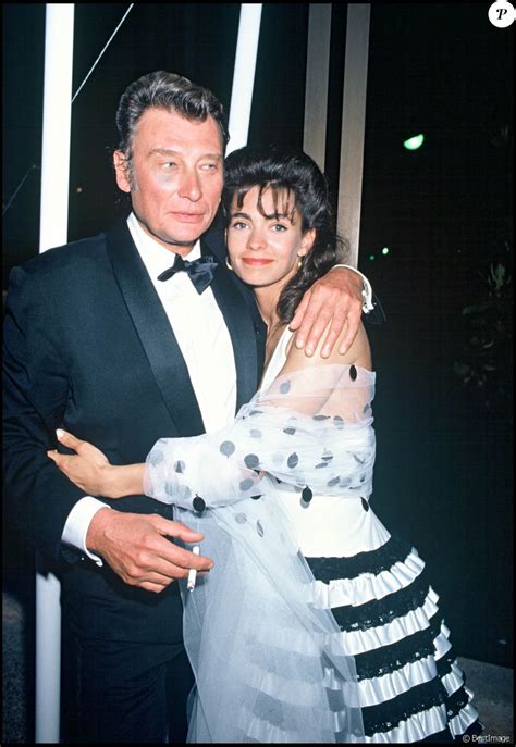 Johnny Hallyday et Adeline Blondieau au Festival de Cannes le 9 mai 1990. - Purepeople