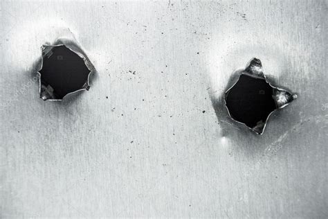 Bullet hole in sheet metal — Stock Photo © Funniefarm5 #14583355