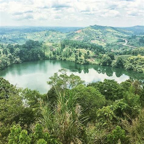 Crater lakes near Fort Portal. In the distance lies Kibale Forest, home of the Chimps 🐒. #Regram ...