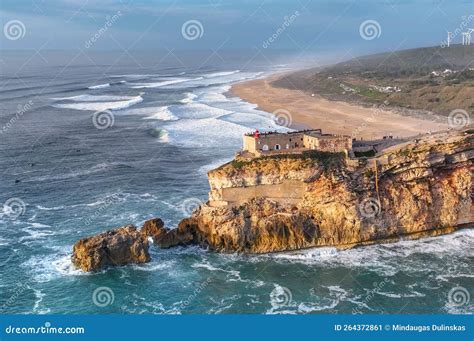 Lighthouse in Nazare, Portugal. Famous Place for Waves and Surfing Stock Image - Image of sport ...