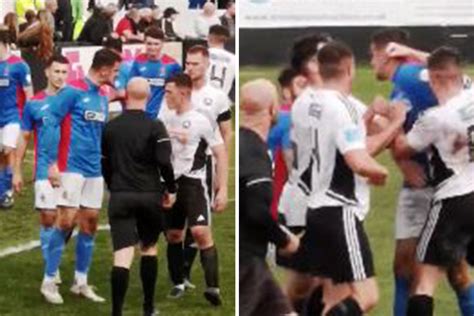 Watch footballers trade punches in shocking mass brawl after seven red ...