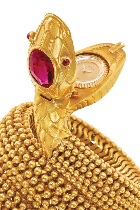 RUBY 'SERPENTI' BRACELET-WATCH, BULGARI | 1960s, Jewelry | Christie's | Bulgari, Bracelet watch ...