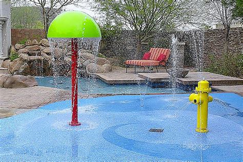 Should You Be Getting a Backyard Splash Pad Instead of a Pool?