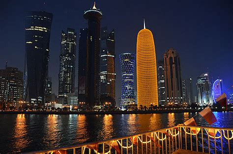 Doha Corniche at night Qatar- travel world time zones