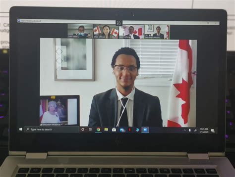 Me taking my Canadian citizenship oath over a zoom call. I am top left, fyi. : r/pics