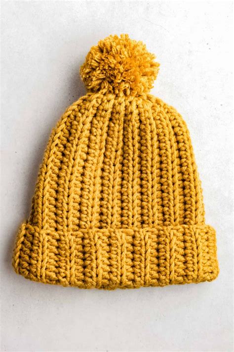 Learn how to make an easy crochet beanie hat with stretchy knit-look half-double crochet ribbing ...