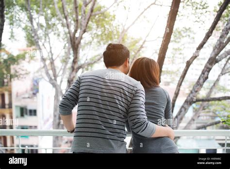 Couple hugging sad hi-res stock photography and images - Alamy