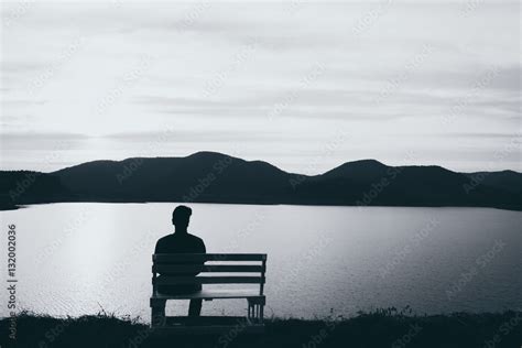 The silhouette of boy sitting alone, concept of lonely, sad, alone, person space, alone and ...