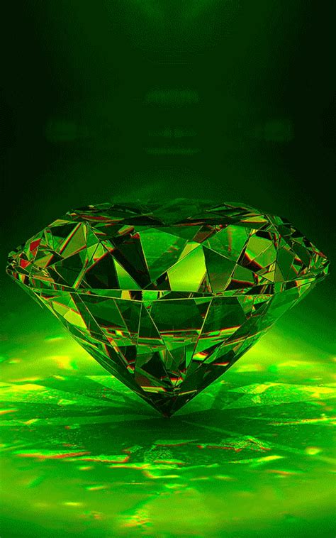 a shiny green diamond sitting in the middle of a dark room with bright lights on it