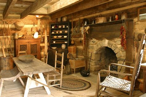 Arched stone fireplace in an old log cabin - Handmade Houses with Noah Bradley