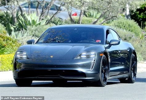 Matthew Perry drives around Los Angeles in a $114,000 Porsche Taycan 4S | Daily Mail Online