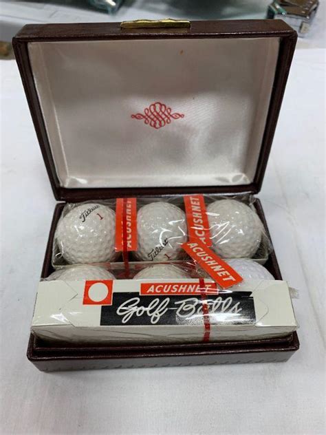 #246 Acushnet Golf Balls | EstateSales.org