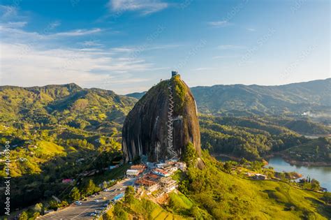 Aerial view of Piedra del Penol touristic attraction, a huge rock with steps to the top near ...