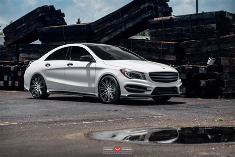 White Mercedes CLA Sits on Vossen Wheels with Green Brakes — CARiD.com ...