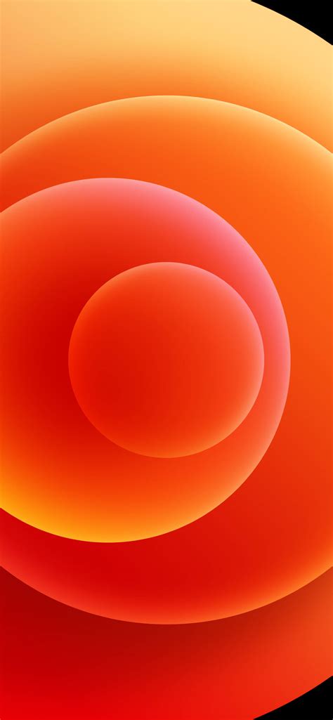 Download Iphone 12 Pro Orange Orbs Wallpaper | Wallpapers.com