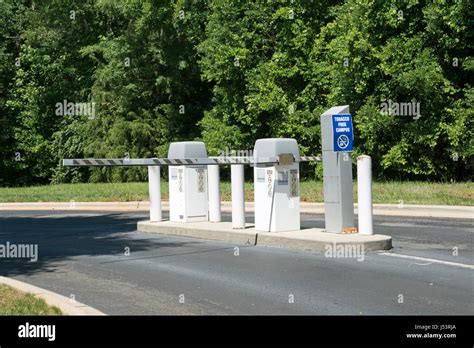 Parking Lot Security Gate Stock Photo - Alamy