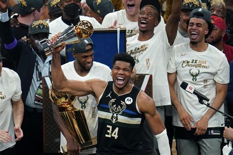 Giannis Antetokounmpo Kisses NBA Championship Trophy, Then Tells Finals MVP Trophy "Don't Be ...