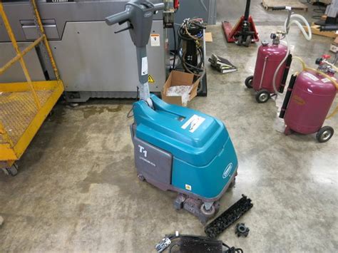 Machines Used | Tennant Model T1 Lithium Ion Walk Behind Floor Scrubber with Charger. 2773 Hours ...