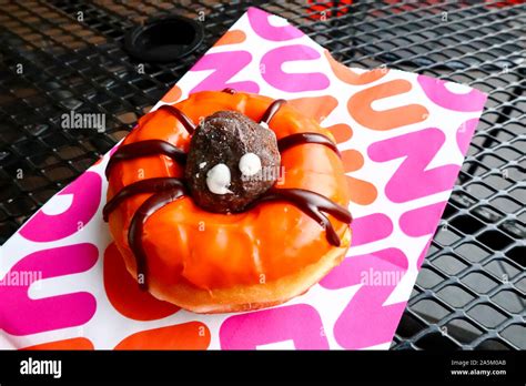 DUNKIN' DONUTS, Dunkin' Spider Donut creation for Halloween Stock Photo ...