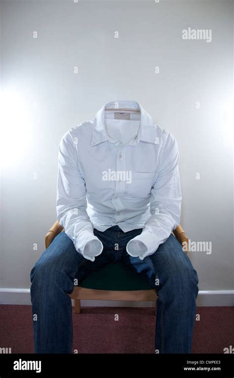 Invisible Clothes sitting down Stock Photo - Alamy