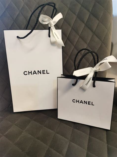 Chanel paper bag, Luxury, Bags & Wallets on Carousell