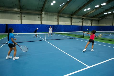 A doubles game at Angus Glen Tennis Centre, Markham Ontario | Tennis center, Indoor tennis ...