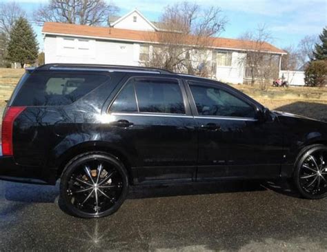 Cadillac SRX Photos and Specs. Photo: Cadillac SRX auto and 25 perfect ...