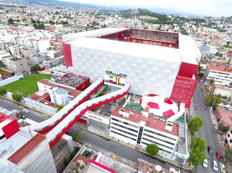 an aerial view of a soccer stadium and its surrounding buildings in the ...