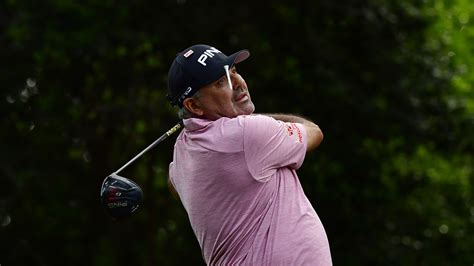 Masters champion Angel Cabrera of Argentina drives from the No. 2 tee ...