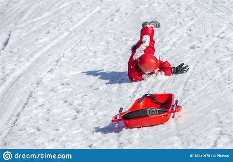 Kids Lying on Snow after Slide Accident Editorial Photo - Image of ...