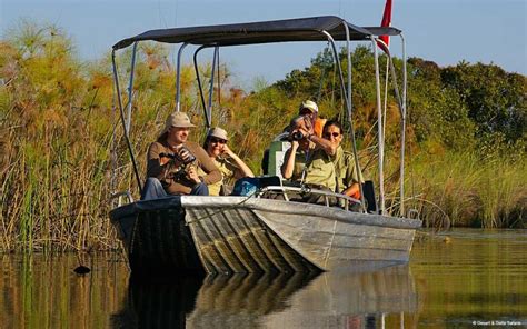 A Boat Safari in the Okavango - Botswana Specialists