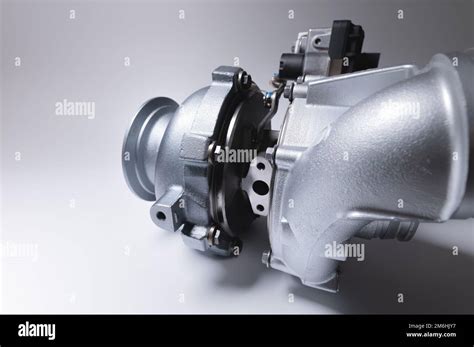 New metal turbocharger. Exhaust gas blower. Parts background Stock Photo - Alamy