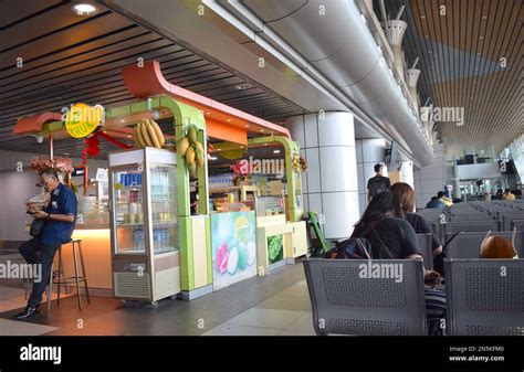 KK Malaysia airport lounge and people waiting for flight Stock Photo ...