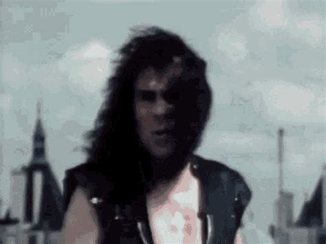 Ronnie James Dio Dio GIF - Ronnie James Dio Dio Rainbow In The Dark - Discover & Share GIFs