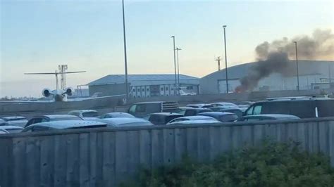 Car catches fire at Bristol Airport - BBC News