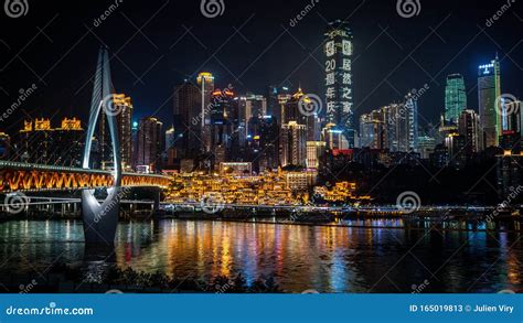 Chongqing City Nightscape with Bridge Buildings and Hongya Cave View Illuminated at Night in ...