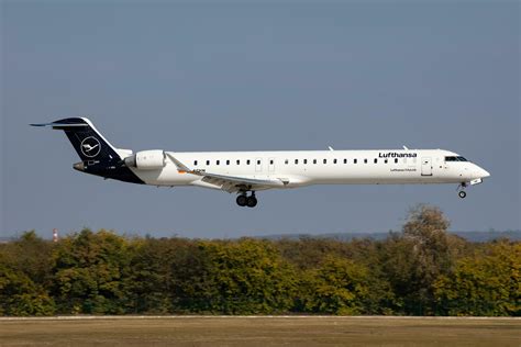 Lufthansa CityLine Bombardier CRJ-900 passenger plane at airport. Aviation and aircraft. Air ...